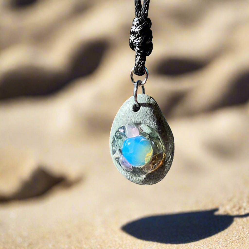 01-PP-O-1 Beach Pebble with Opalite Cabochon and Fluorite Crystal Center