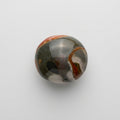 Jasper gemstone featuring earthy colours and distinctive natural patterns, showcased in the J.W.H. Designs gemstone collection.