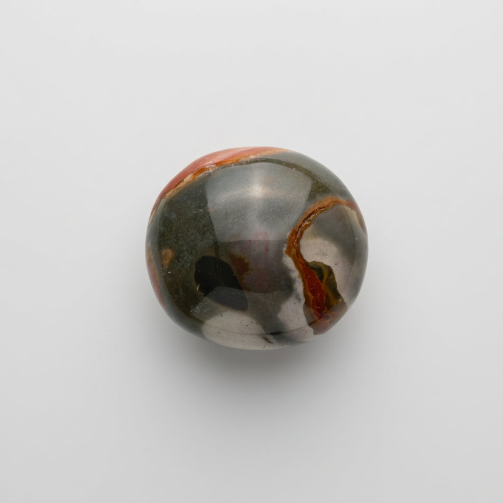 Jasper gemstone featuring earthy colours and distinctive natural patterns, showcased in the J.W.H. Designs gemstone collection.